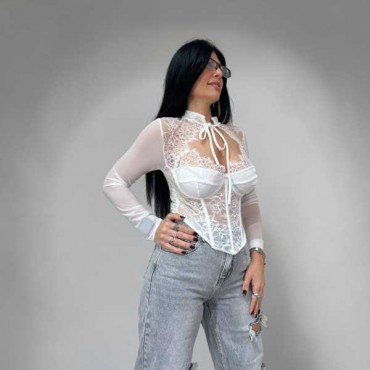 Top A Bustino In Pizzo Bianco Con Maniche Lunghe Trasparenti.